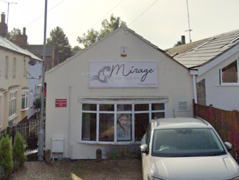 Exterior view of Fleckney Hair & Beauty salon showcasing the welcoming storefront with signage and parked car. Perfect for local beauty and hairdressing services in Fleckney.